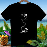 Black t-shirt with white graphic of footprints leading to person under umbrella on beach.