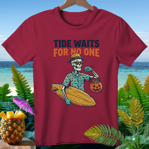 Skeleton with surfboard, pumpkin bucket, and text "TIDE WAITS FOR NO ONE".