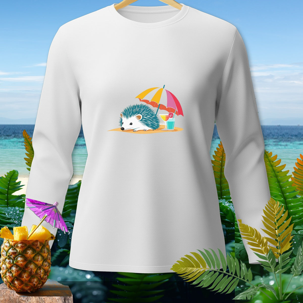 White long-sleeve shirt with a graphic of a hedgehog under an umbrella on a beach.