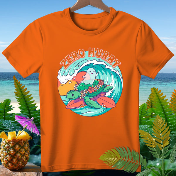 Orange t-shirt with a graphic of a turtle and ghost surfing on a wave, text "ZERO HURRY".