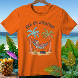 Orange t-shirt with a witch relaxing in a hammock with text 