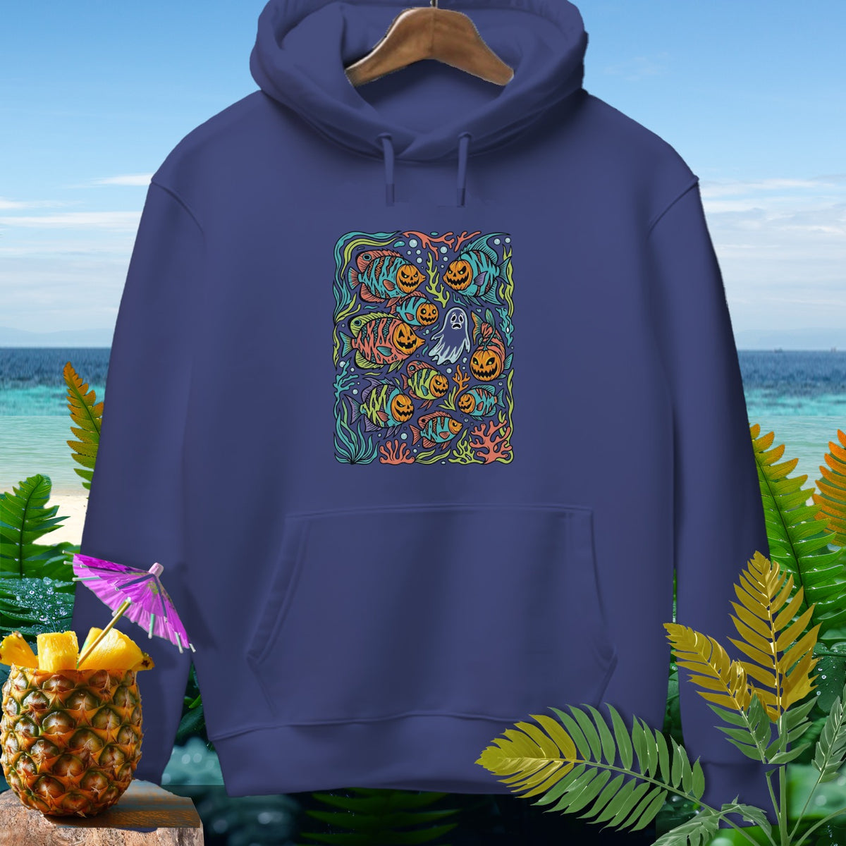Dark blue hoodie with a colorful print of fish, pumpkins, and a ghost.