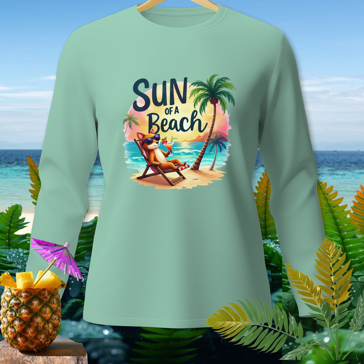 Mint long sleeve shirt with "Sun of a Beach" graphic of a dog on a lounge chair.