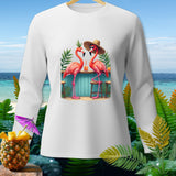 White long-sleeve shirt with graphic of two flamingos at a beach bar.