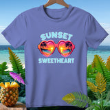 Purple t-shirt with heart-shaped sunglasses showing a sunset and text 