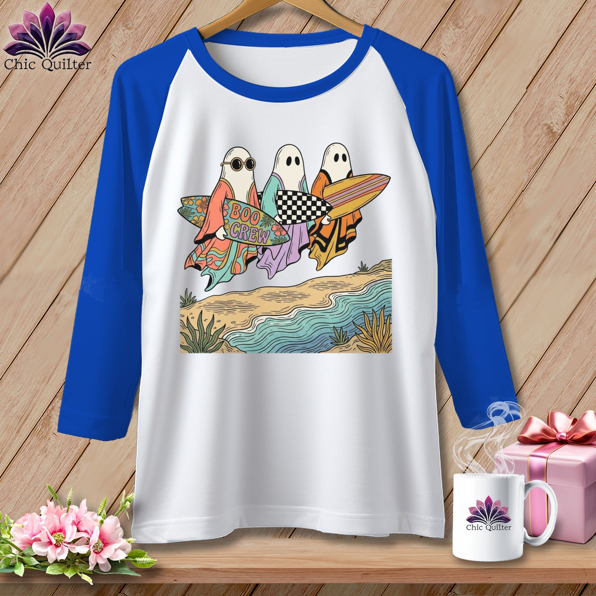 Three ghosts carry surfboards on a beach with "Boo Crew" text.