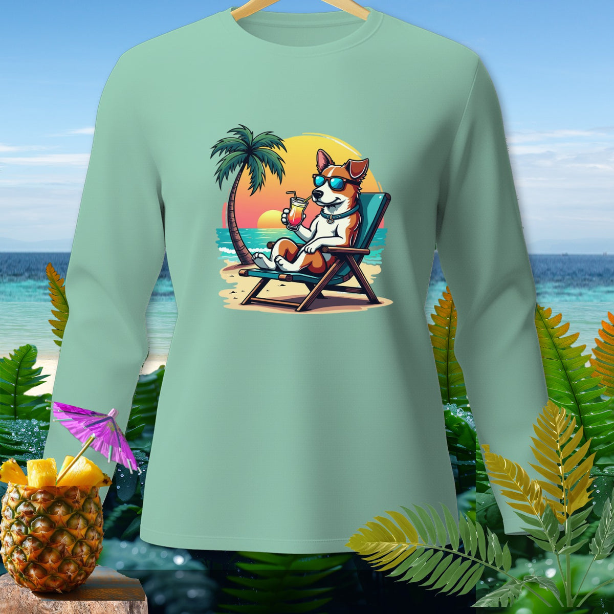 Long sleeve mint t-shirt with cartoon dog relaxing on a beach chair.
