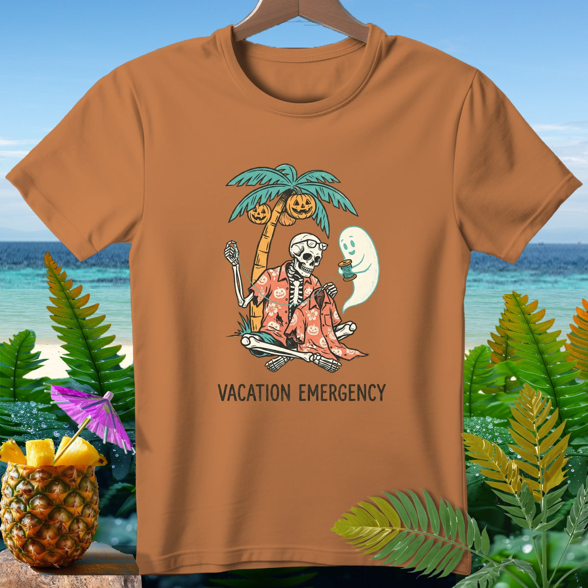 Orange t-shirt with skeleton, ghost, and pumpkins on a palm tree.