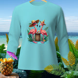 Light blue long sleeve shirt with two flamingos in hats and sunglasses.