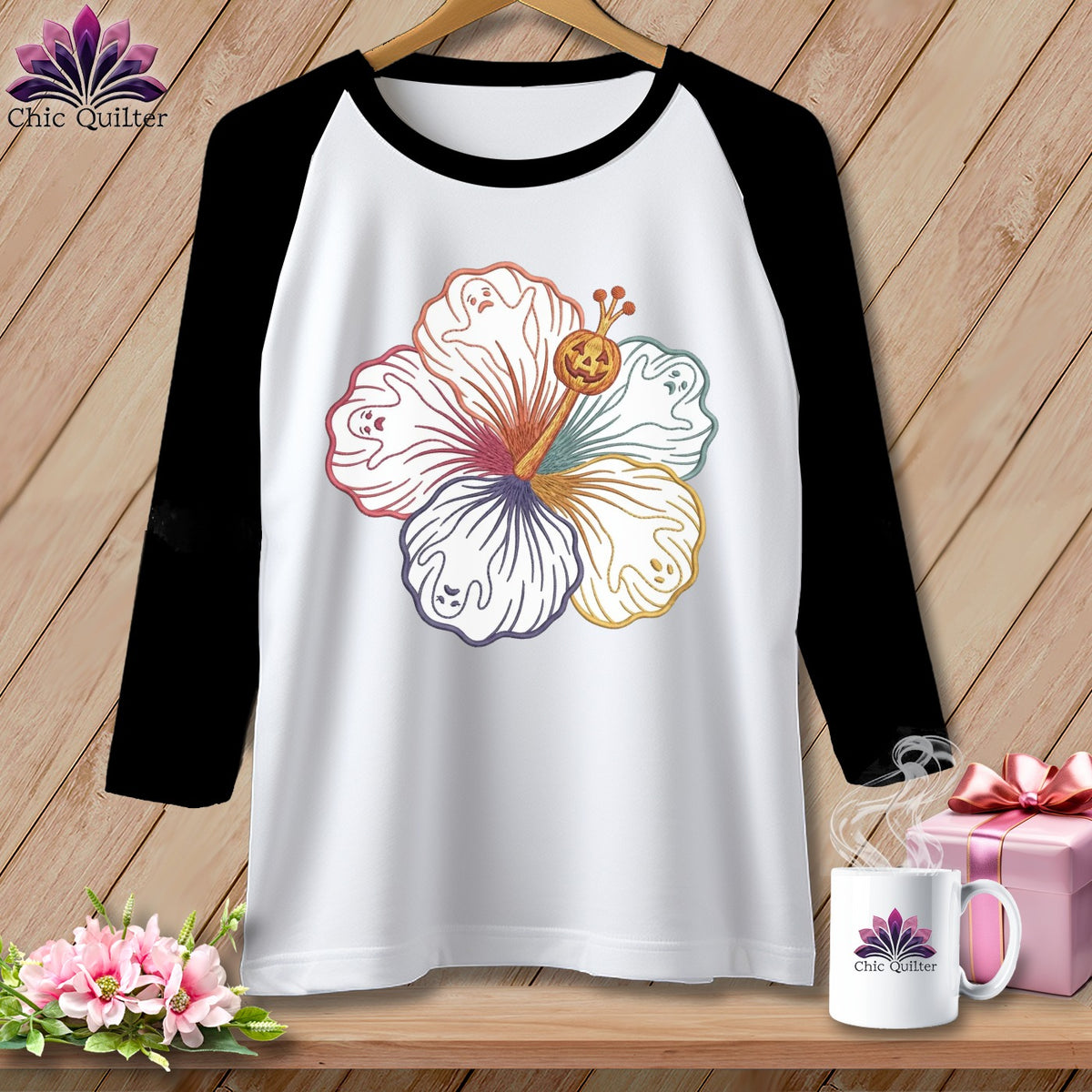 Raglan t-shirt with a colorful hibiscus flower design featuring ghosts and a pumpkin.