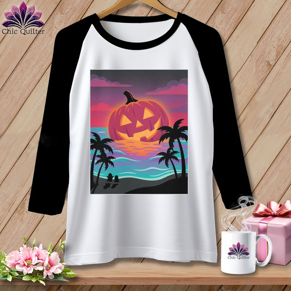 Baseball shirt with a jack-o-lantern on a beach at sunset.