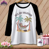 Raglan shirt with witch and cat on a tropical beach, 