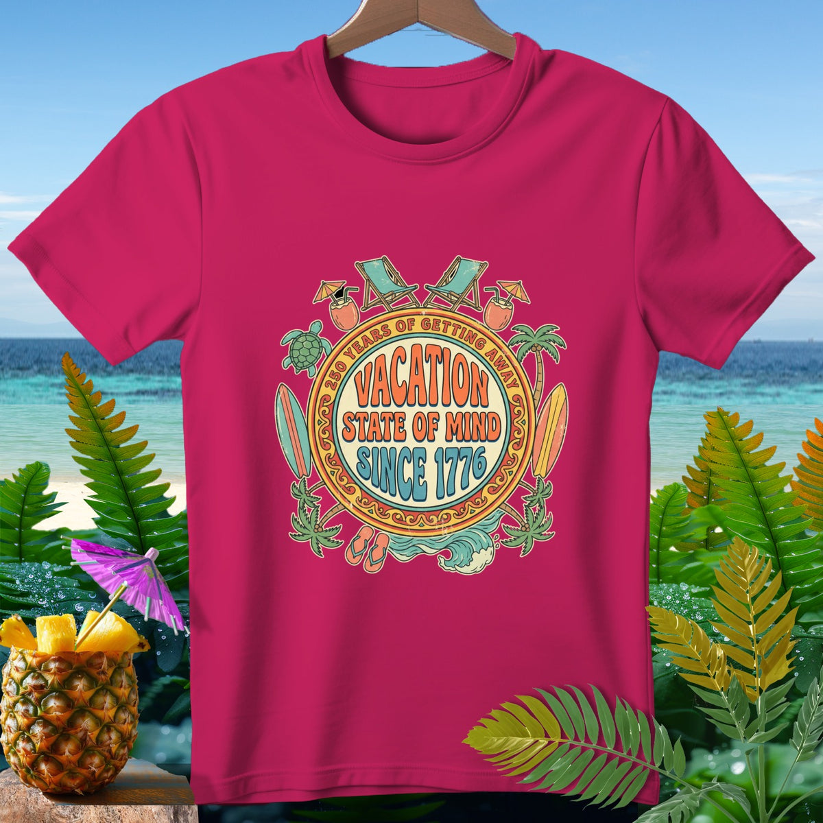 Pink t-shirt with "Vacation State of Mind Since 1776" graphic.