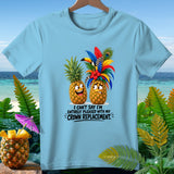 Light blue t-shirt with two cartoon pineapples, one happy, one worried, with text.