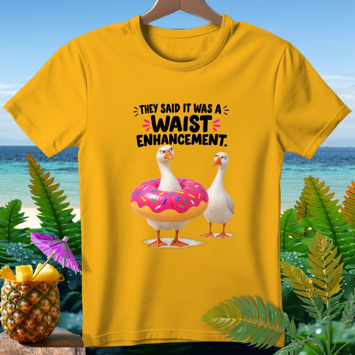 Yellow t-shirt with geese, a donut float, and "Waist Enhancement" text.