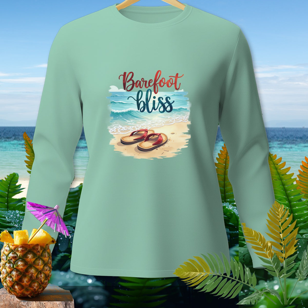 Mint long-sleeve shirt with "Barefoot bliss" graphic of beach and flip-flops.