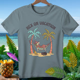 T-shirt with illustration of witch in hammock, broom, cat, and text 