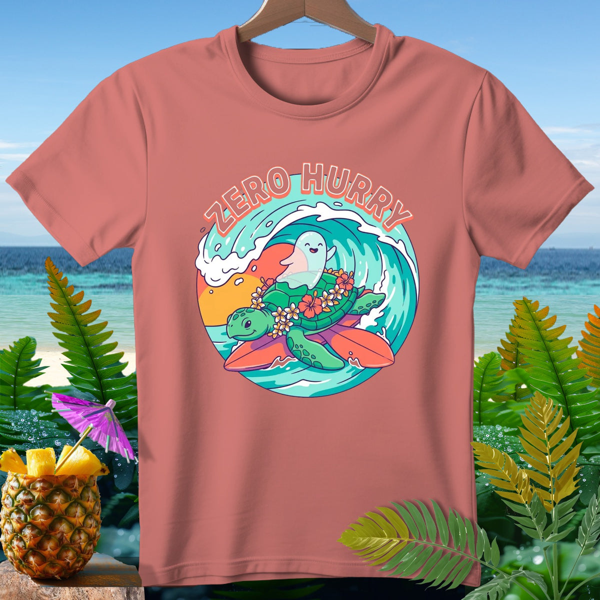 Coral t-shirt with a graphic of a turtle surfing a wave with text "Zero Hurry".