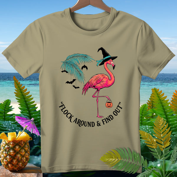 T-shirt with pink flamingo in witch hat, bats, and "Flock Around & Find Out" text.