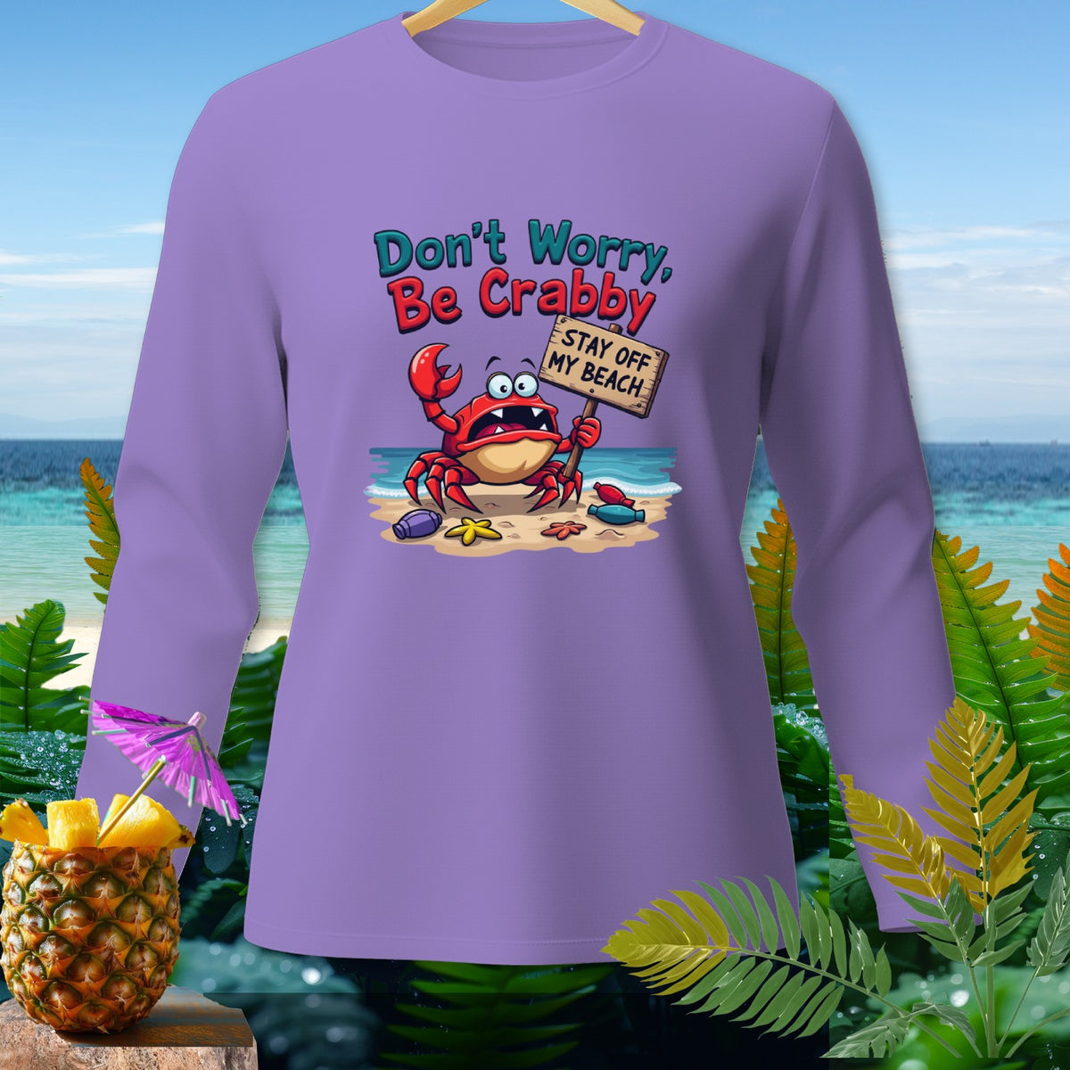 Purple long-sleeve shirt with a cartoon crab holding a "Stay Off My Beach" sign.