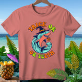 Coral t-shirt with a shark wearing a witch hat and holding a pumpkin, text 