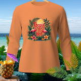 Orange long-sleeve shirt with flamingos, tropical leaves, and text 
