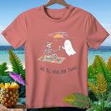 T-shirt with skeleton and ghost on beach with text 