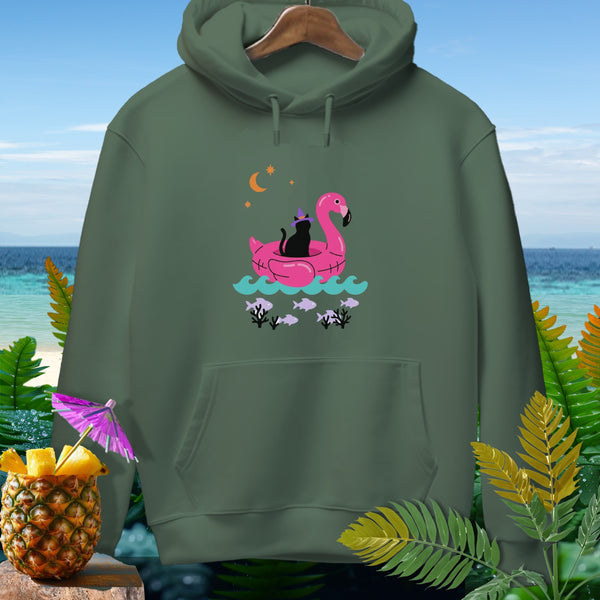 Green hoodie with black cat on pink flamingo float and tropical foliage.