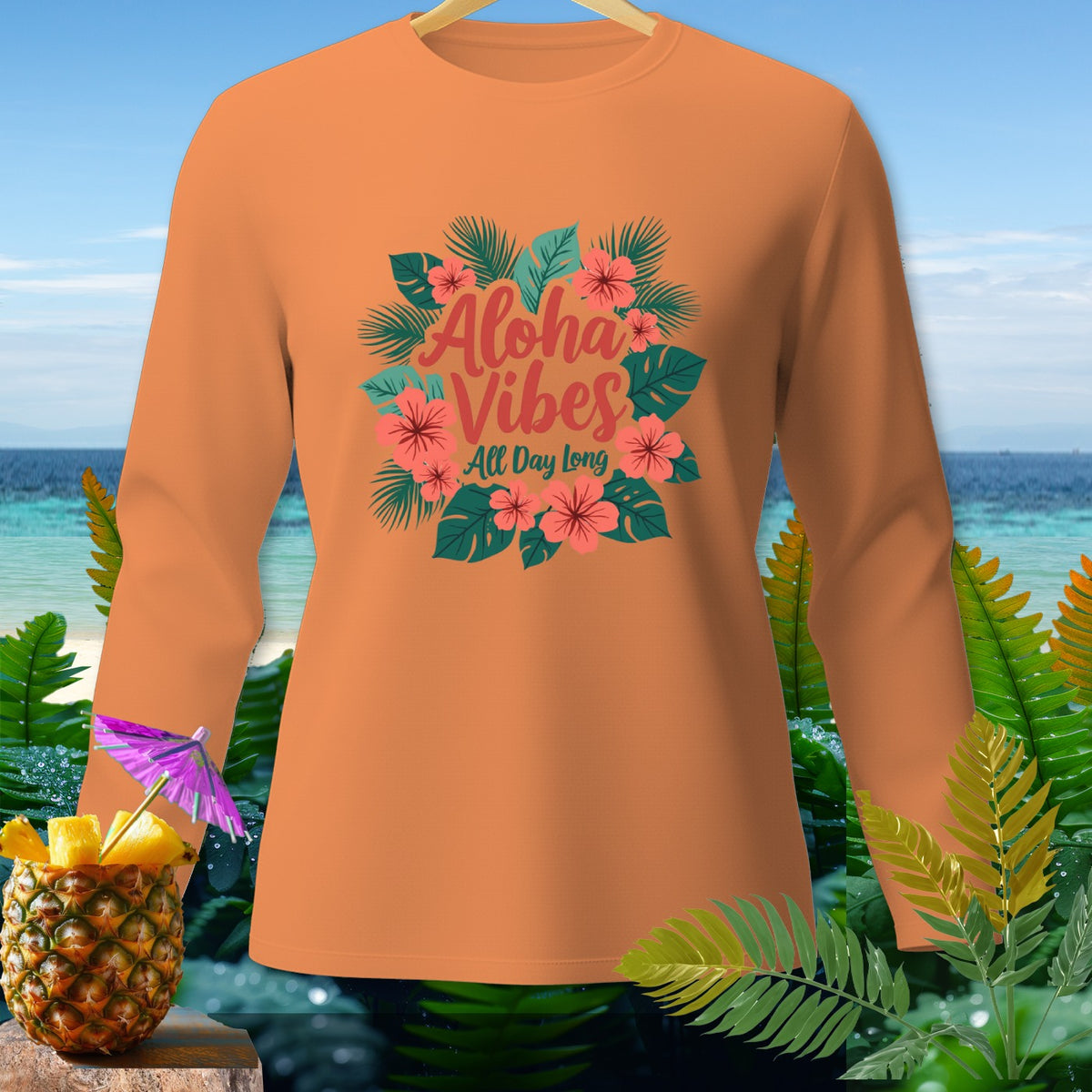 Orange long-sleeve shirt with "Aloha Vibes All Day Long" floral graphic.