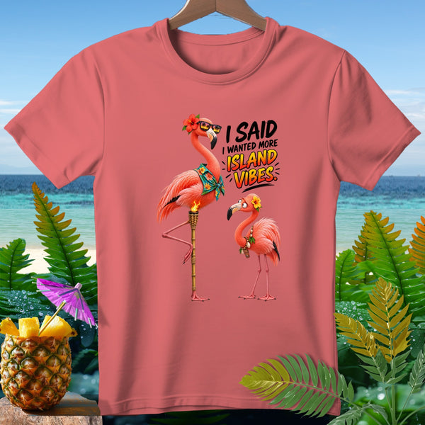 T-shirt with cartoon flamingos and "I Said I Wanted More Island Vibes" text.