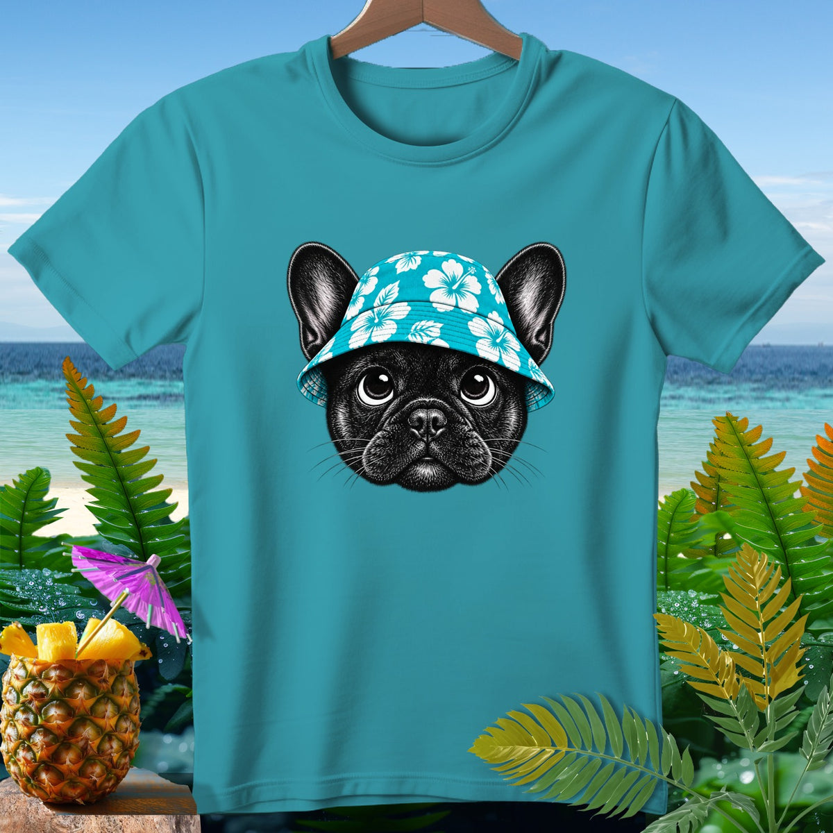 Teal t-shirt with black French bulldog wearing a blue hibiscus hat.