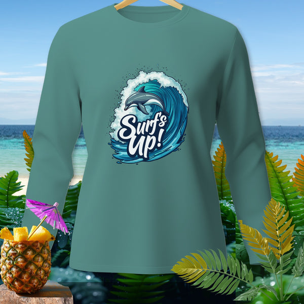 Teal long-sleeve shirt with a dolphin riding a wave graphic and text "Surf's Up!".