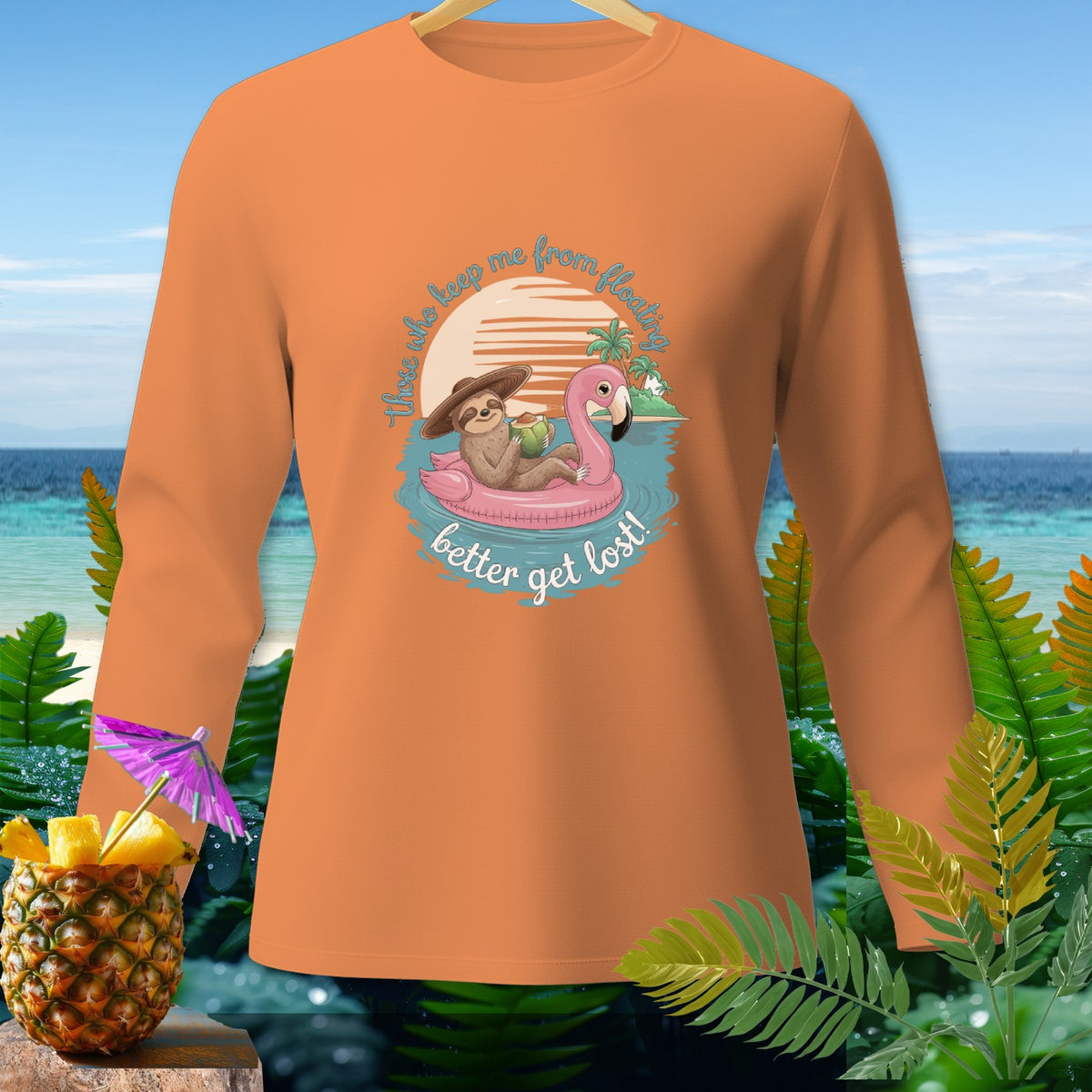 Orange long-sleeve shirt with sloth on flamingo float saying "better get lost!"