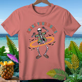 Salmon t-shirt with a dancing skeleton wearing sunglasses and a Hawaiian shirt.