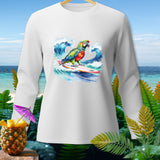 White long-sleeve shirt with a colorful parrot surfing on a surfboard against ocean waves.
