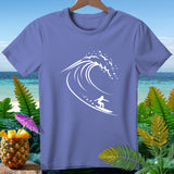 Periwinkle t-shirt with white surfer and wave graphic, tropical background.