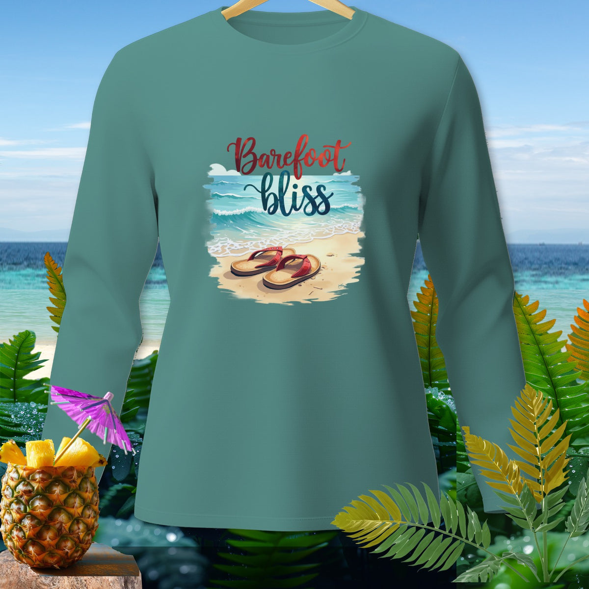 Teal long-sleeve shirt with "Barefoot bliss" graphic featuring flip-flops on beach.