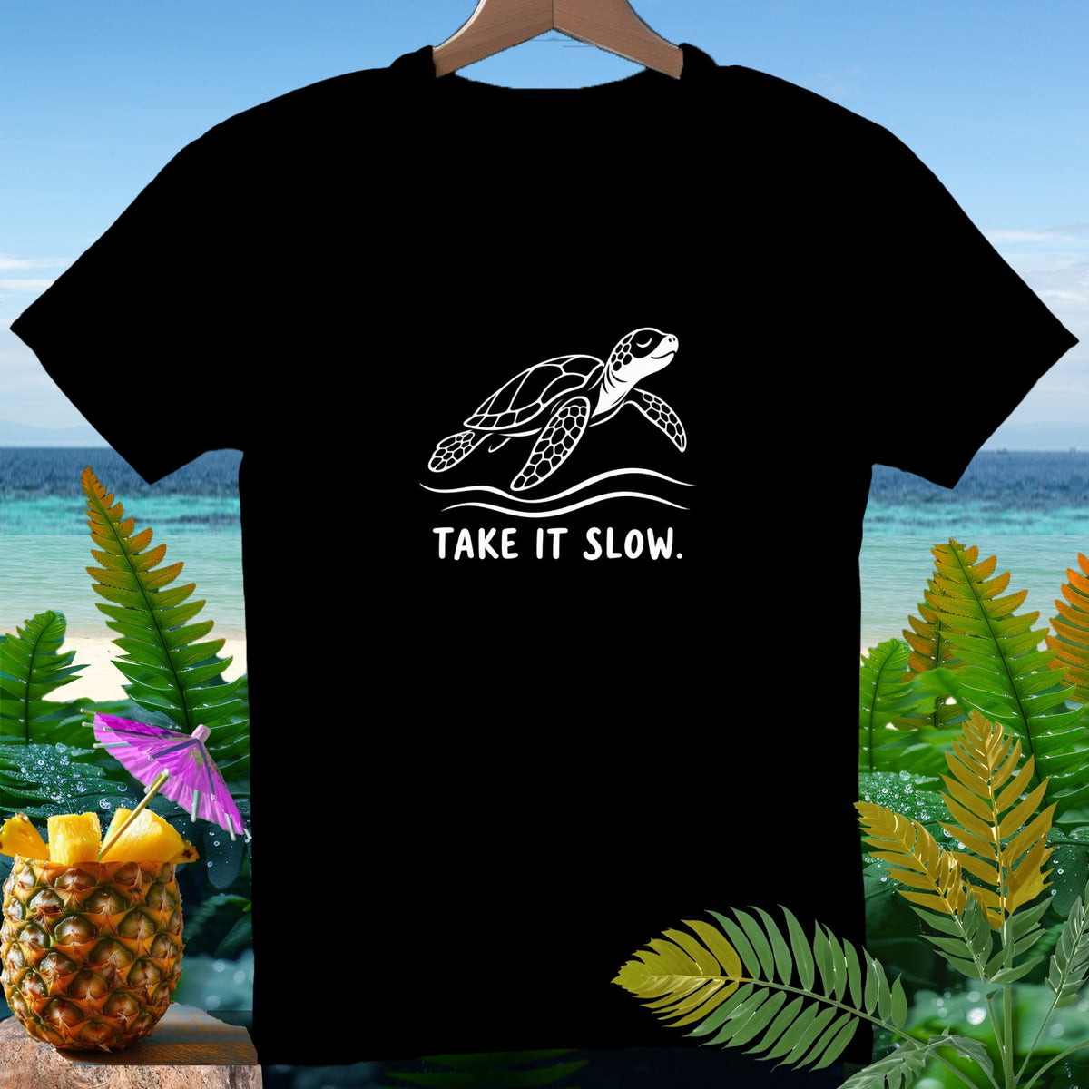 Black t-shirt with white sea turtle graphic and "TAKE IT SLOW." text.