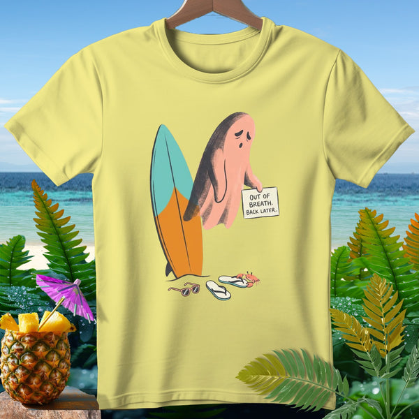 Yellow t-shirt featuring a cartoon ghost with a surfboard, flip-flops, and sign.