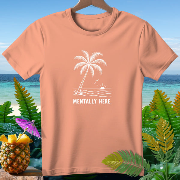Peach t-shirt with white palm tree, ocean, and sun graphic and text.