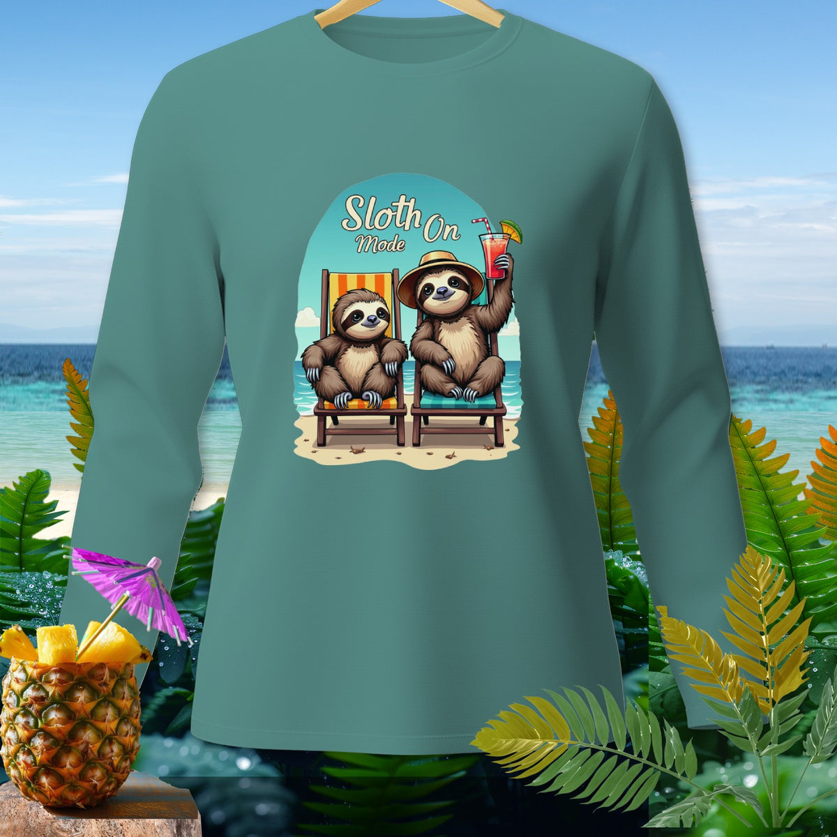 Teal long sleeve shirt with sloths relaxing on beach chairs, text "Sloth On Mode".