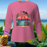 Pink long-sleeve shirt with cartoon flamingos at a tropical bar.