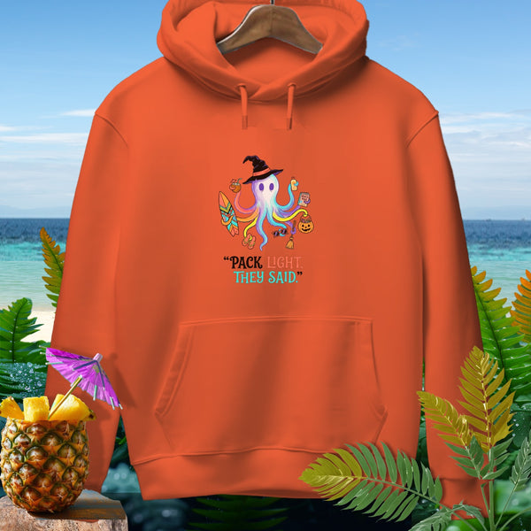 Orange hoodie with a cartoon octopus wearing a witch hat and carrying beach items.