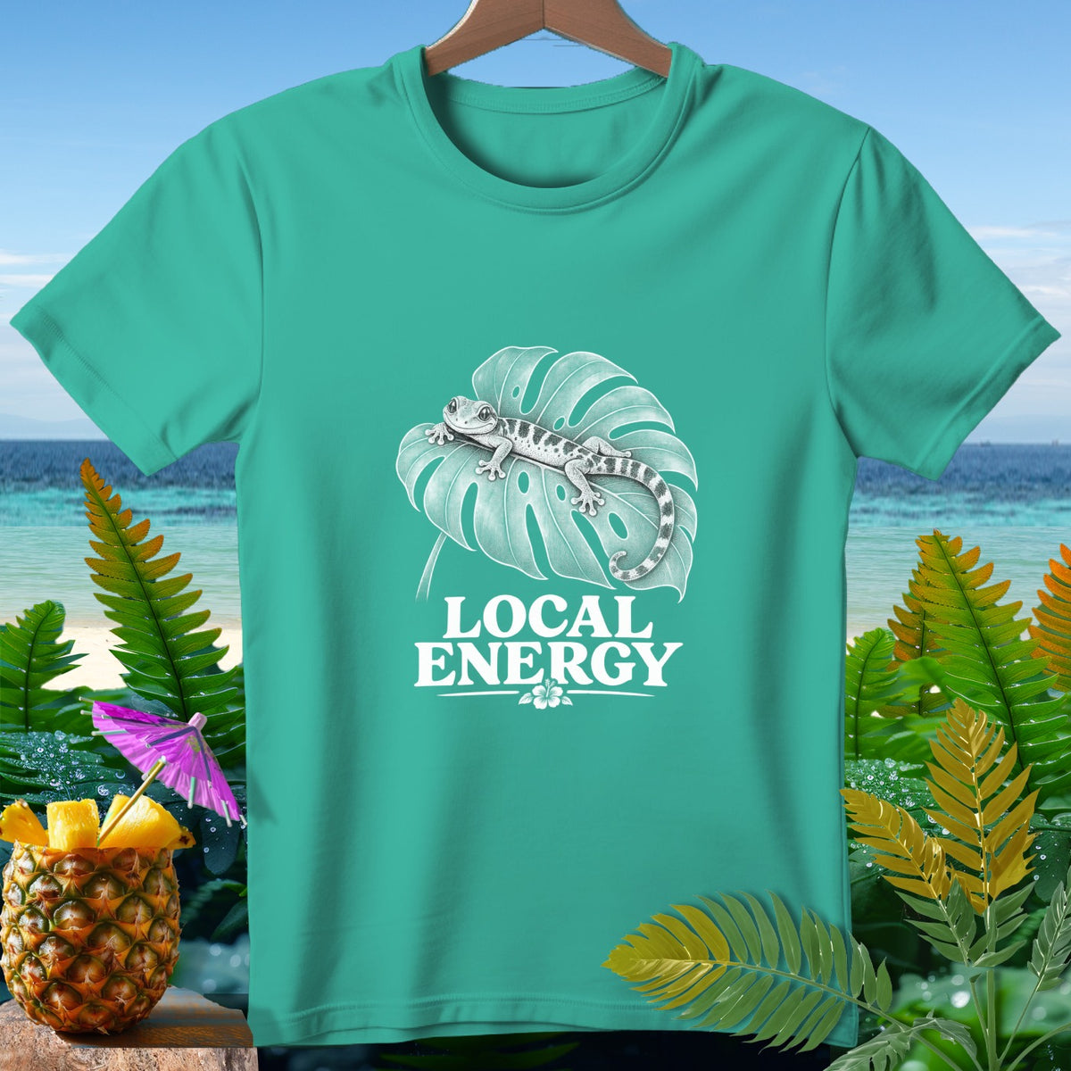 Teal t-shirt with gecko on a leaf and "LOCAL ENERGY" text.