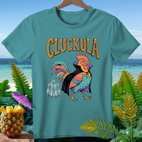Teal t-shirt with "Cluckula" text and a rooster dressed as Dracula with ghosts.