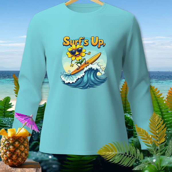 Light blue long-sleeve shirt with a cartoon sun wearing sunglasses surfing on a wave.