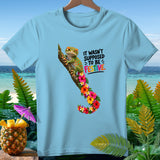 Light blue t-shirt with a gecko on a branch surrounded by flowers and the text 
