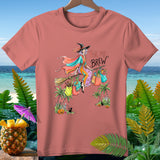 T-shirt with witch flying on broomstick, carrying shopping bags, text 