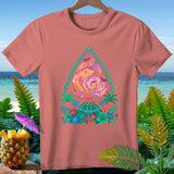 Coral t-shirt with a tropical volcano and ghost graphic, framed by a tropical beach background.