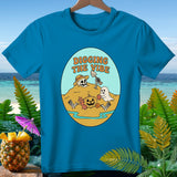 Teal t-shirt with Halloween beach graphic and text 